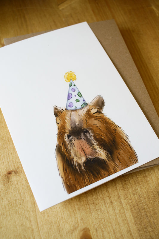 Capybara Wearing a Birthday Hat - Greeting Card