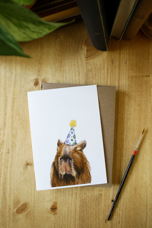 Capybara Wearing a Birthday Hat - Greeting Card