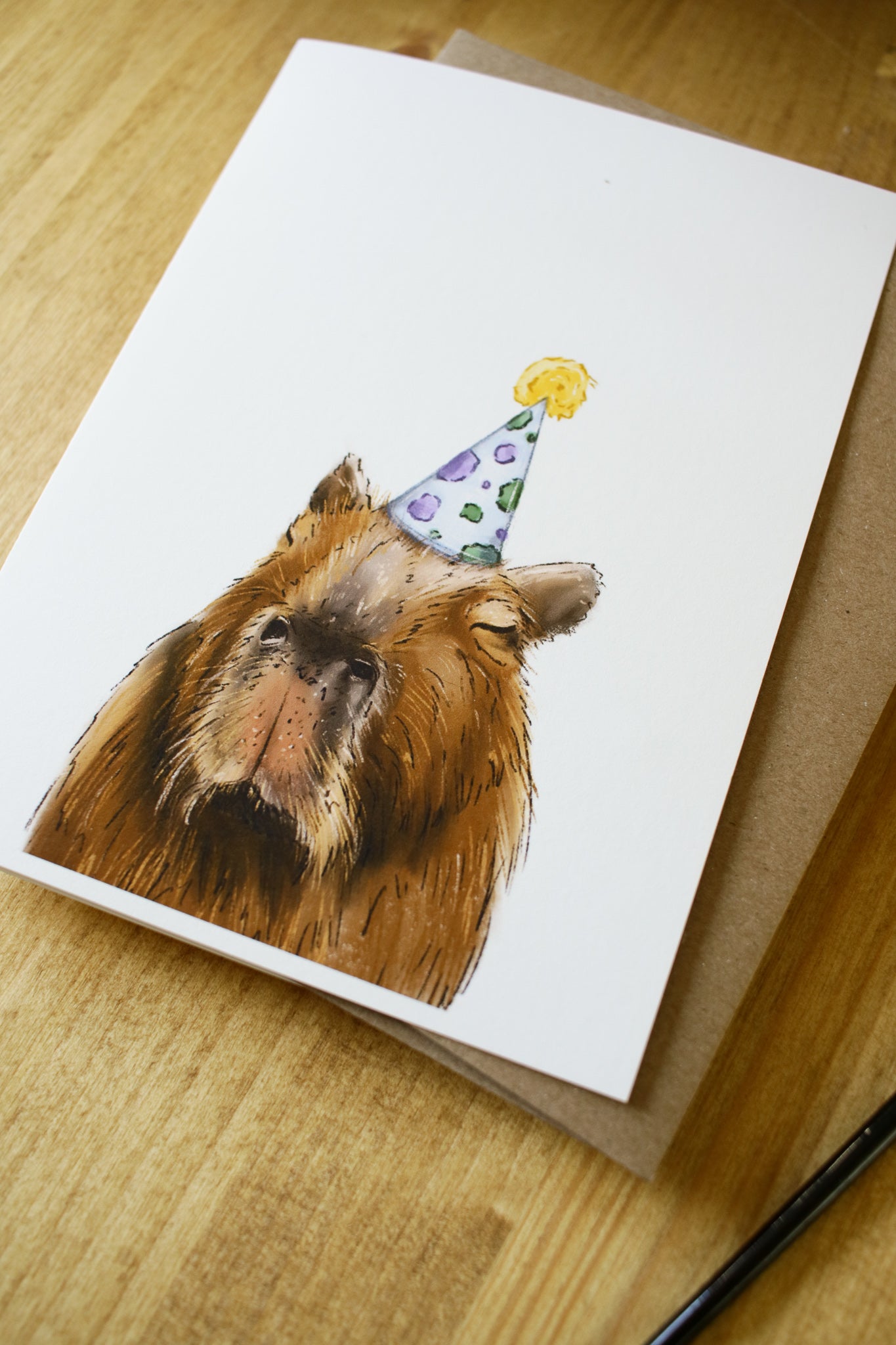 Capybara Wearing a Birthday Hat - Greeting Card
