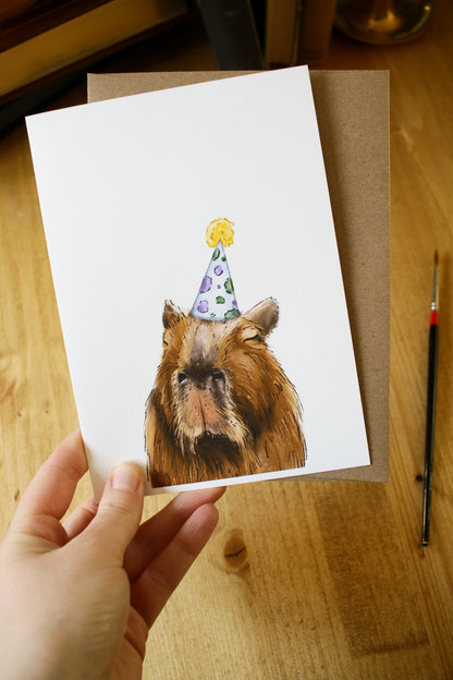 Capybara Wearing a Birthday Hat - Greeting Card