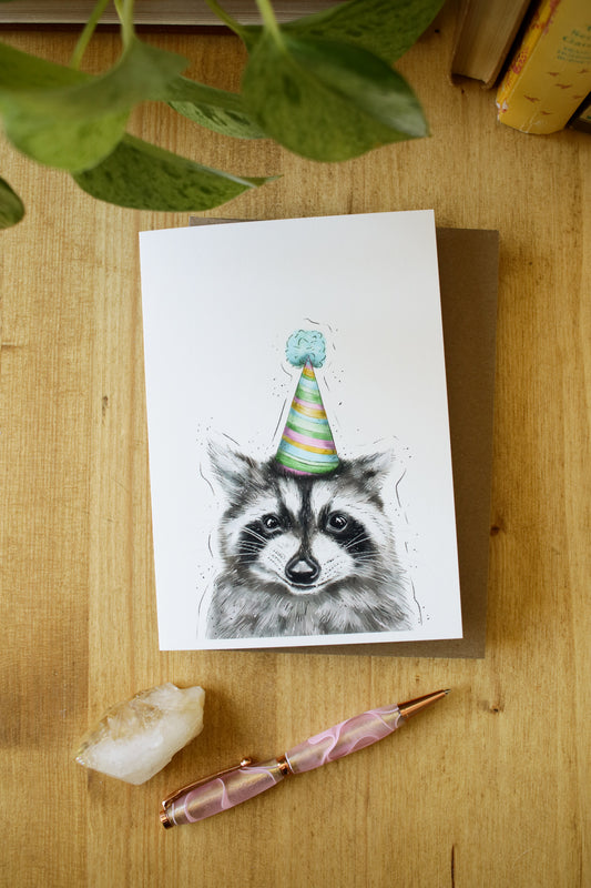 Racoon Wearing a Birthday Hat - Greeting Card